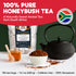 Agulhas Honeybush Tea pouch, black teapot, honey jar and a bowl of loose tea in a red-headed promotional graphic.